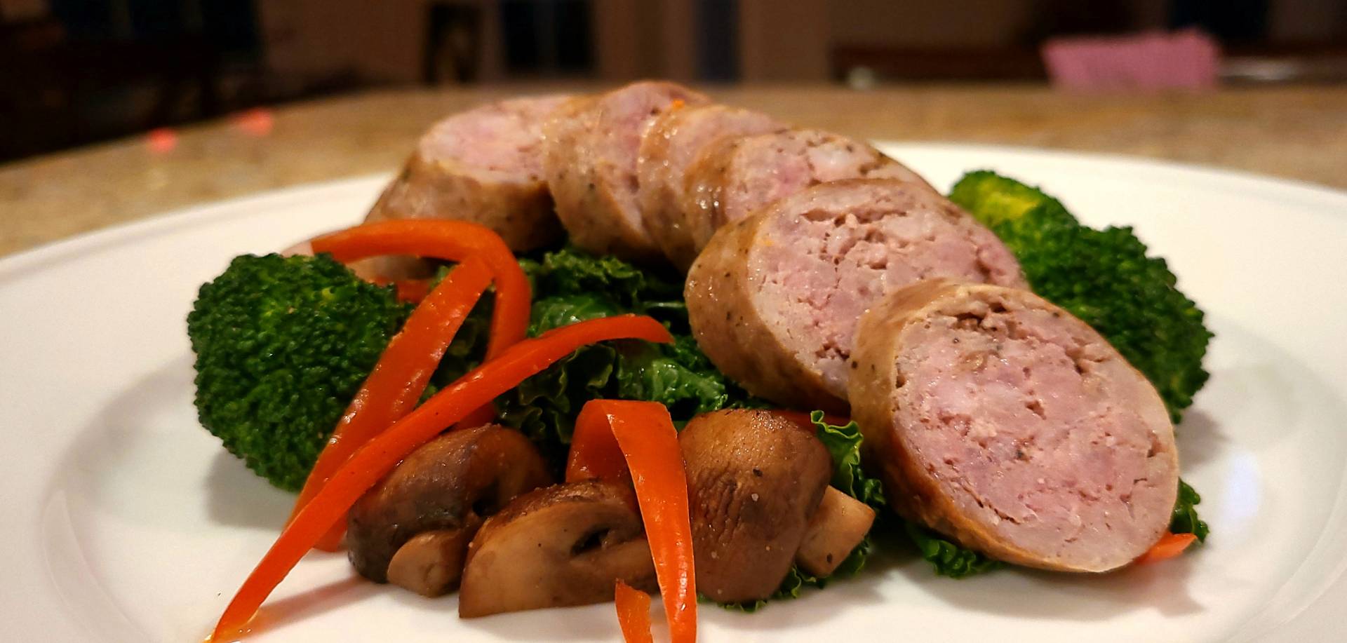 KETO Pork Sausage with Kraut and CriminiBroccoli Saute
